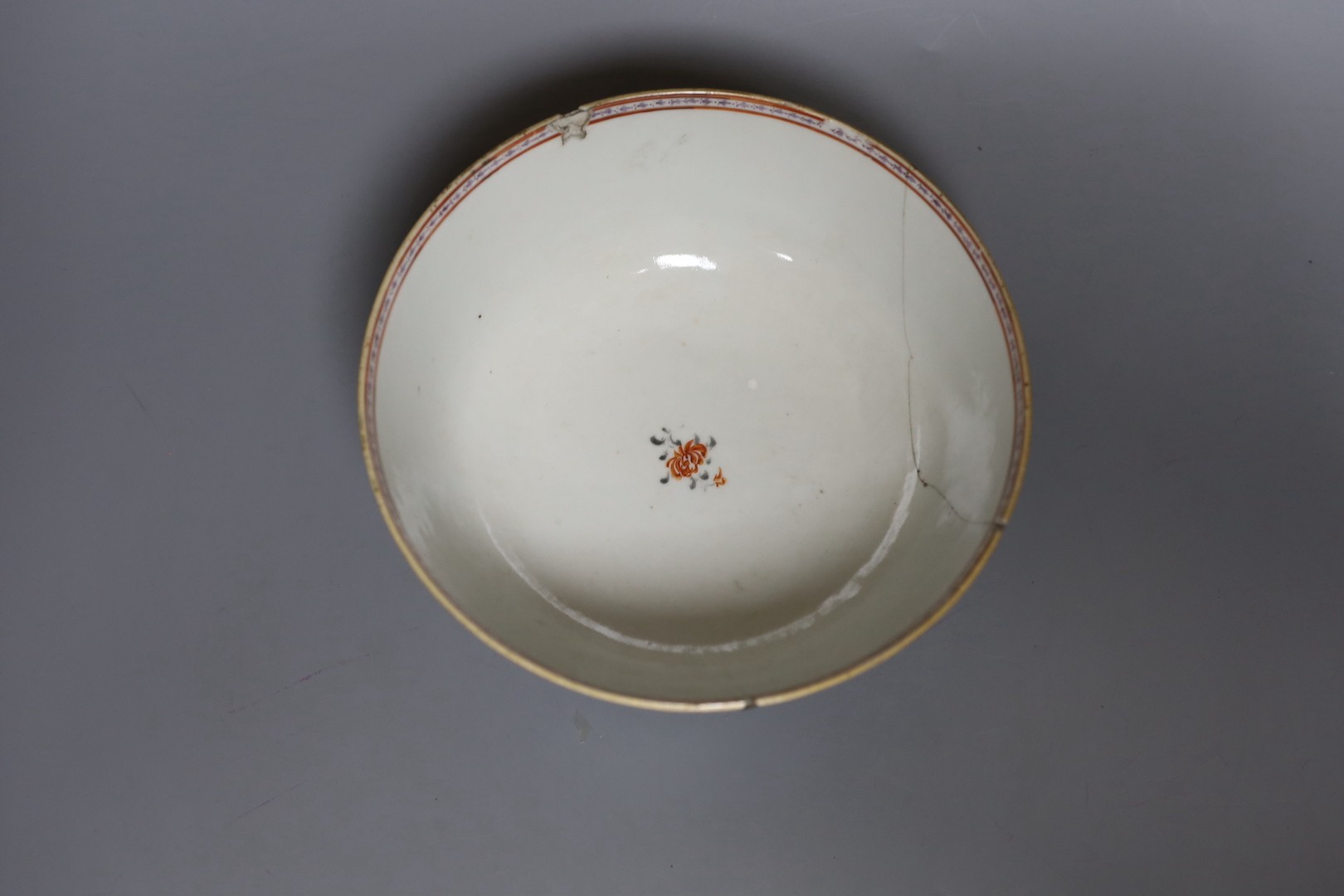 Two 18th century Chinese export bowls, a similar tea bowl and another Chinese blue and white tea bowl, largest 20cm diameter